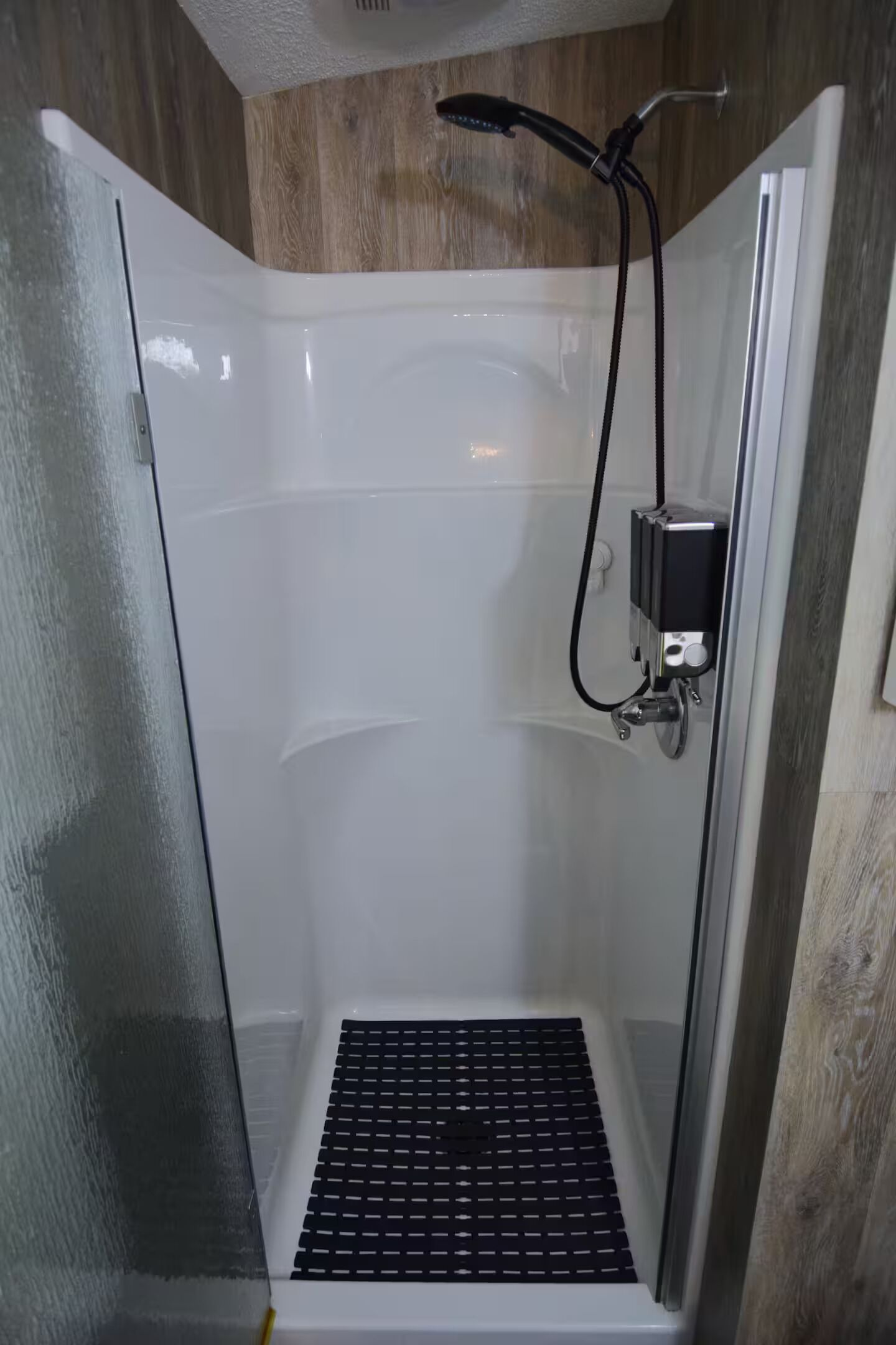 Shower, towels, soap, toilet paper