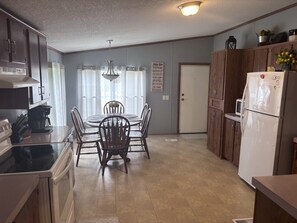 Coffee/tea maker, fridge, microwave, oven