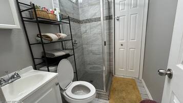 Shower, hair dryer, towels, soap