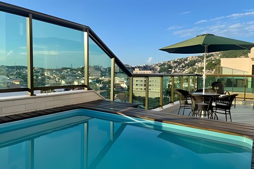 Beachfront Penthouse at Praia dos Anjos with Private Pool and Barbecue Grill