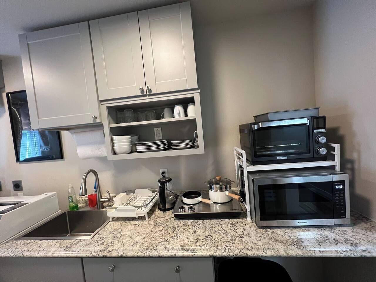 Fridge, microwave, electric kettle, cookware/dishes/utensils