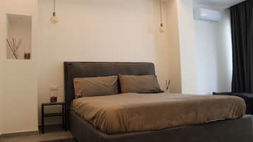 Family Quadruple Room | Minibar, individually furnished, free WiFi