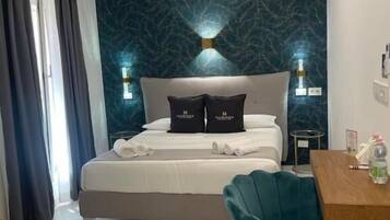 Doppia Deluxe, vista cortile | Una cassaforte in camera, tende oscuranti, insonorizzazione