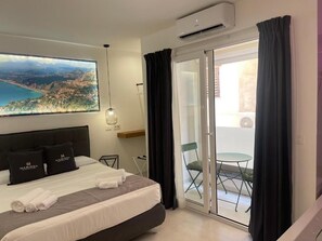 Suíte superior, vista para o pátio | Cofres nos quartos, cortinas blackout, quartos à prova de som