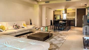 Apartamento Deluxe, vistas a la playa | Zona de estar