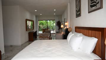 Luxury Suite, Garden View | In-room safe, desk, laptop workspace, iron/ironing board