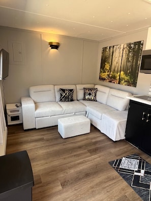 Living area - Surrounded by nature, immersed in comfort in this chic modern tiny home! (Sicamous)
