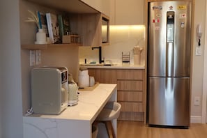 Private kitchen - New and cozy: on the beach and with a pool (Ingleses, Florianópolis) (Florianópolis)