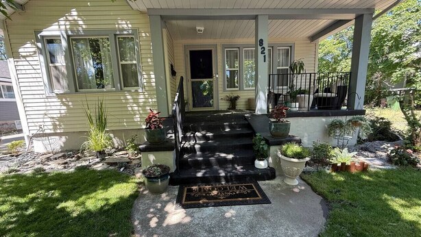 A house with a front porch, steps, and a welcome mat. - Elegant & Classic (South Hill Vibes) (Spokane)