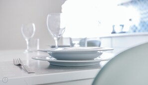 A dining table with a plate, a fork, and a glass. - Italianway - San Calocero 29 B (Milano)