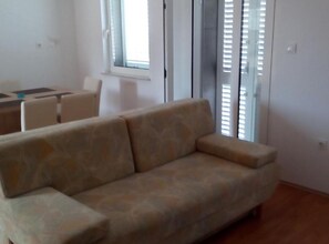 TV - Two Bedroom Apartment with Balcony and Sea View (Karlobag)