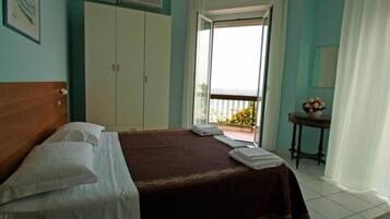 Classic Double Room, Patio | Desk, blackout drapes, iron/ironing board, free WiFi