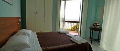 Classic Double Room, Patio | Desk, blackout drapes, iron/ironing board, free WiFi