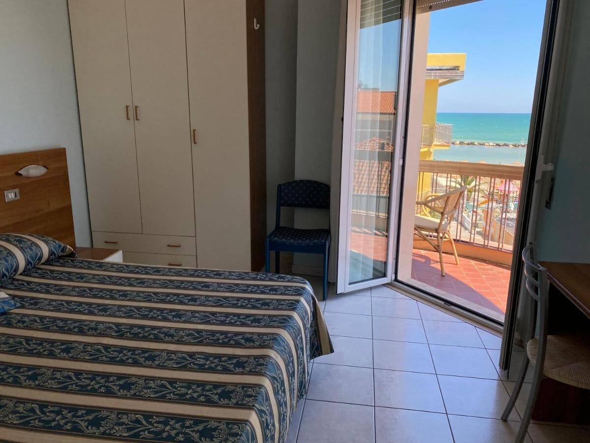Desk, blackout drapes, iron/ironing board, WiFi (free)