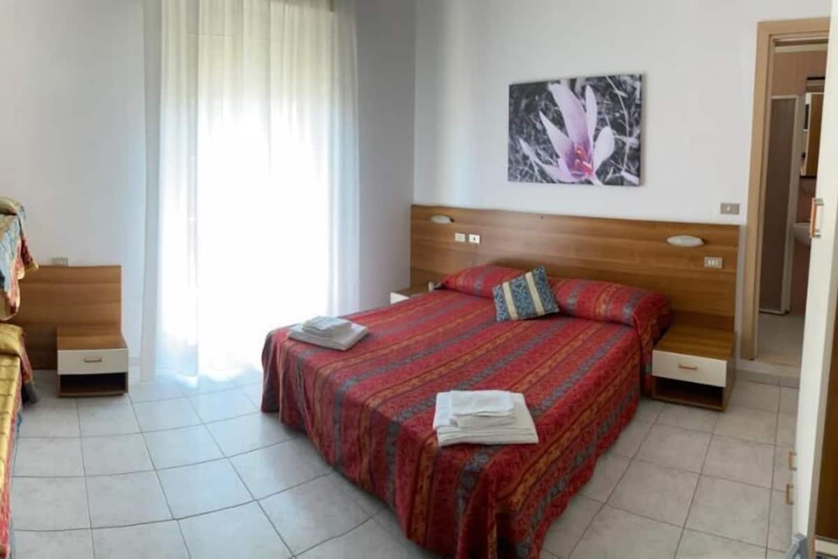Comfort Quadruple Room, Patio, Sea View | Desk, blackout drapes, iron/ironing board, WiFi (free)