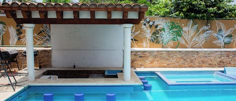 Outdoor pool, open 9:00 AM to 9:00 PM, pool umbrellas, pool loungers