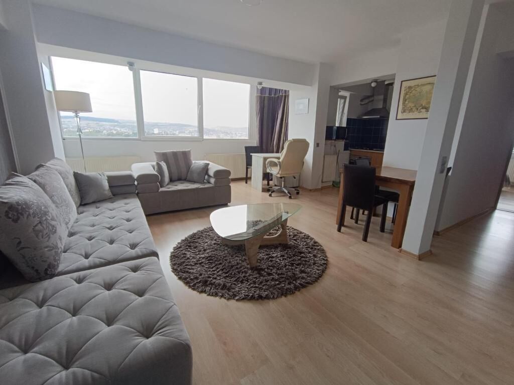 Appartement Panoramique, balcon, vue ville | Coin séjour