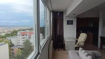 Panoramic Apartment, Balcony, City View | Living area