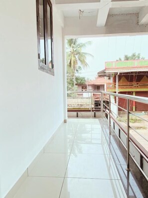 Standard Suite, Balcony, Mountain View | Property grounds - Thekkumpuram Residency (Kondotty)
