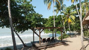 Private beach, beach towels, beach yoga, beach bar