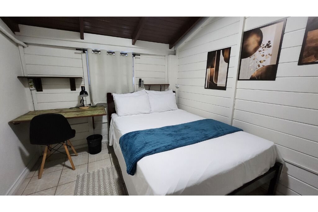 Desk, laptop workspace, free WiFi, bed sheets
