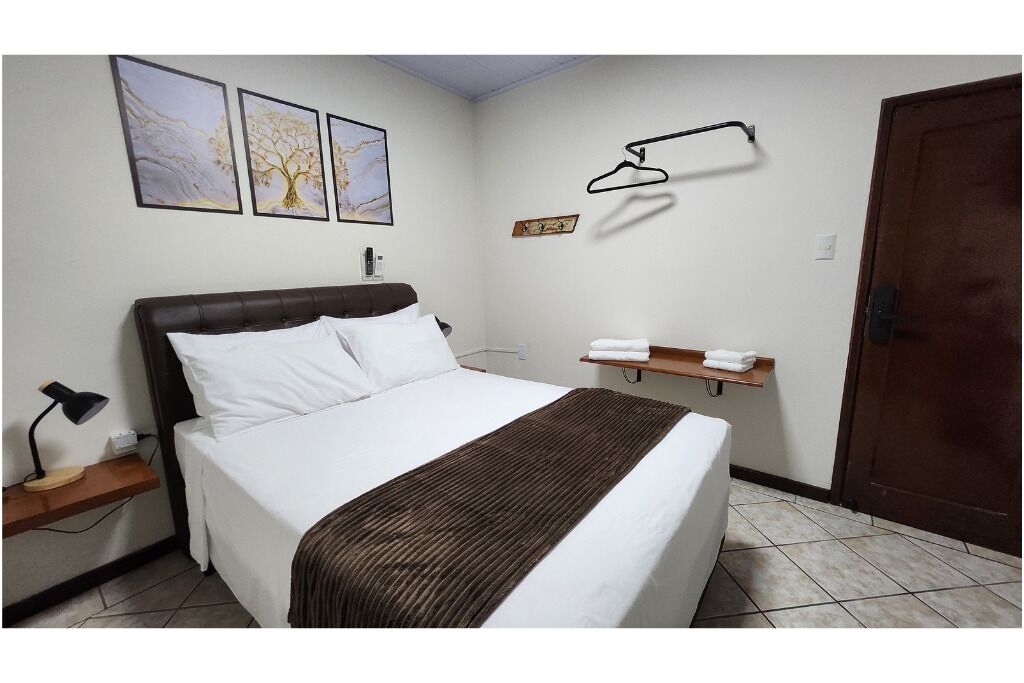 Desk, laptop workspace, free WiFi, bed sheets
