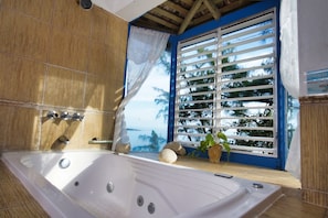 Comfort Room, Balcony, Beach View | Bathroom | Free toiletries, towels, soap, toilet paper - Blessings at Strawberry Fields (Robin's Bay)