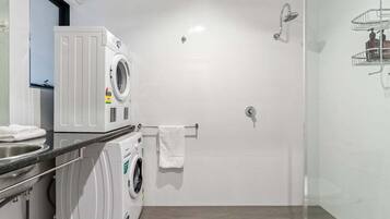 Hair dryer, towels, soap, shampoo