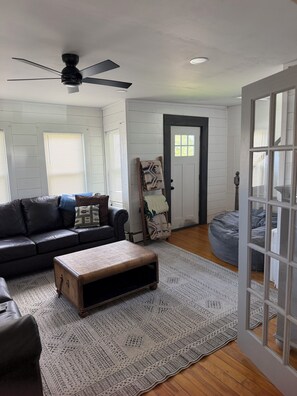 Living area - Easy walk to Rangeley lake, shops& restaurant. Easy access to snowmobile trails. (Rangeley)