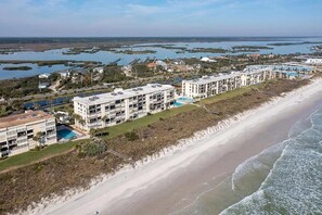 A coastal hotel with multiple buildings, a beach, and a marina. - Amazing 4th floor 3/2 condo at Sand Dollar Unit 3-407! (St. Augustine)