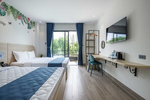 A hotel room with two beds, a desk, a TV, and a window with curtains. - Bin Bin Hotel 1 - Near RMIT Univerisity (Ho Chi Minh City)