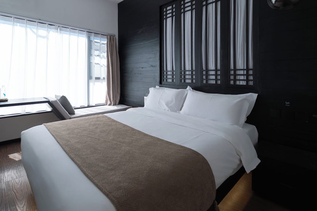 Basic Double Room, Hill View | Down duvets, minibar, desk, blackout curtains
