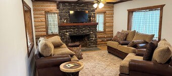 Fully restored 3-bedroom log cabin in Tupper Lake perfect for relaxing stays.