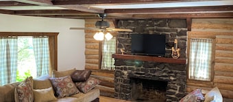 Fully Restored 3-bedroom log cabin in Tupper Lake perfect for relaxing stays.