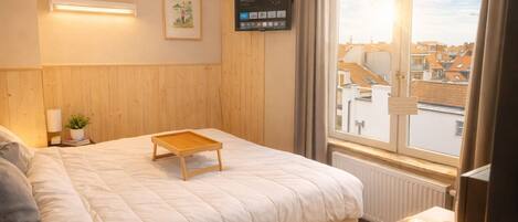 1 habitación, tabla de planchar con plancha, wifi y ropa de cama