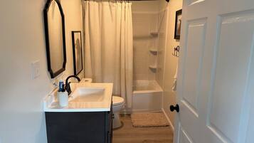 Hair dryer, towels, soap, toilet paper