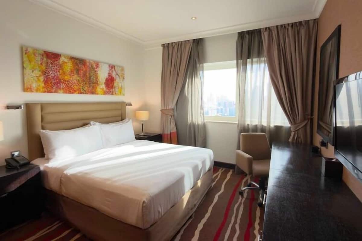 Apartamento standard, 2 quartos | Frigobar, escrivaninha, ferros/tábuas de passar roupa, Wi-Fi de cortesia