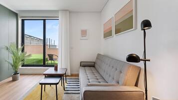 Desk, laptop workspace, blackout curtains, iron/ironing board