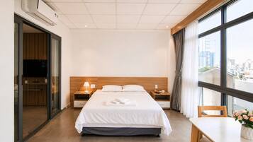 Luxury Apartment, 1 Bedroom, City View | Frette Italian sheets, premium bedding, pillowtop beds, in-room safe