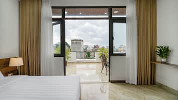 Family Suite, City View | Minibar, desk, laptop workspace, blackout drapes