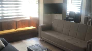 Familienapartment, Stadtblick | Wohnbereich