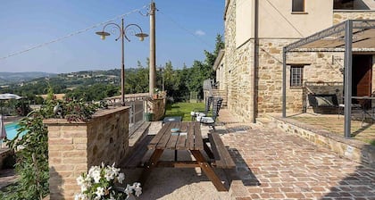 Villa Pietrarosa: A characteristic and welcoming three-story age-old estate made of stone, with Free WI-FI.