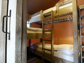 A bunk bed room with a ladder, wooden walls, and a window. - Holiday Home in Otterlo With Terrace (Otterlo)