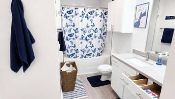 Hair dryer, towels, soap, toilet paper
