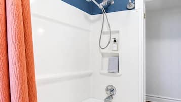 Shower, hair dryer, shampoo