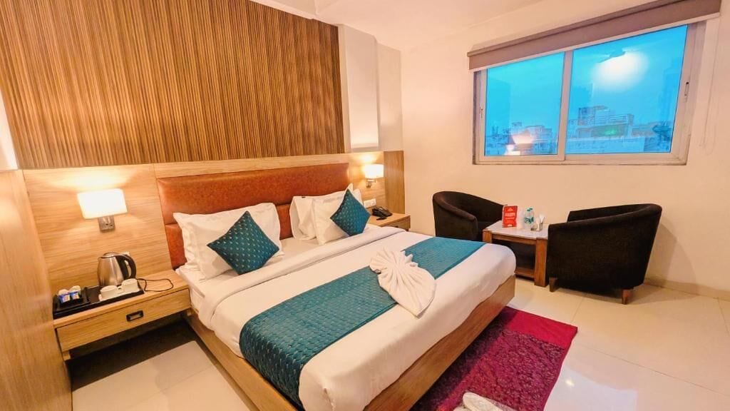 Deluxe Room, City View | In-room safe, iron/ironing board, free WiFi