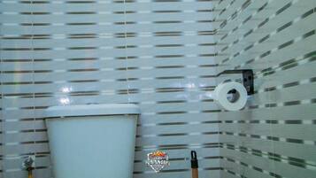 Shower, slippers, towels, soap