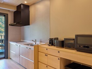 Fridge, microwave, stovetop, cookware/dishes/utensils