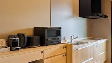Fridge, microwave, stovetop, cookware/dishes/utensils