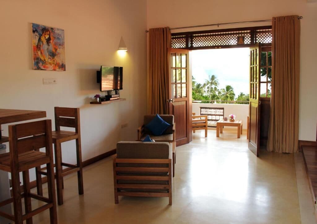 Deluxe-Apartment, Balkon, Blick auf den Innenhof | Wohnbereich